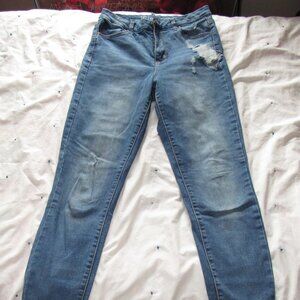 Medium Blue Denim Jeans with a Rip